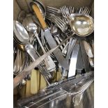 A small collection of silver cutlery com