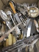 A small collection of silver cutlery com