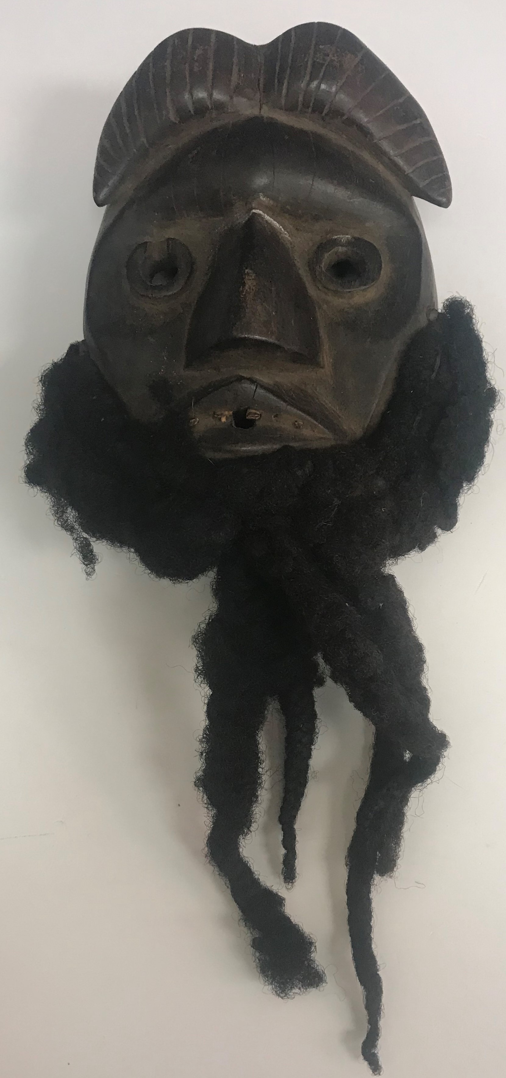 A West African "Dan" mask with real hair