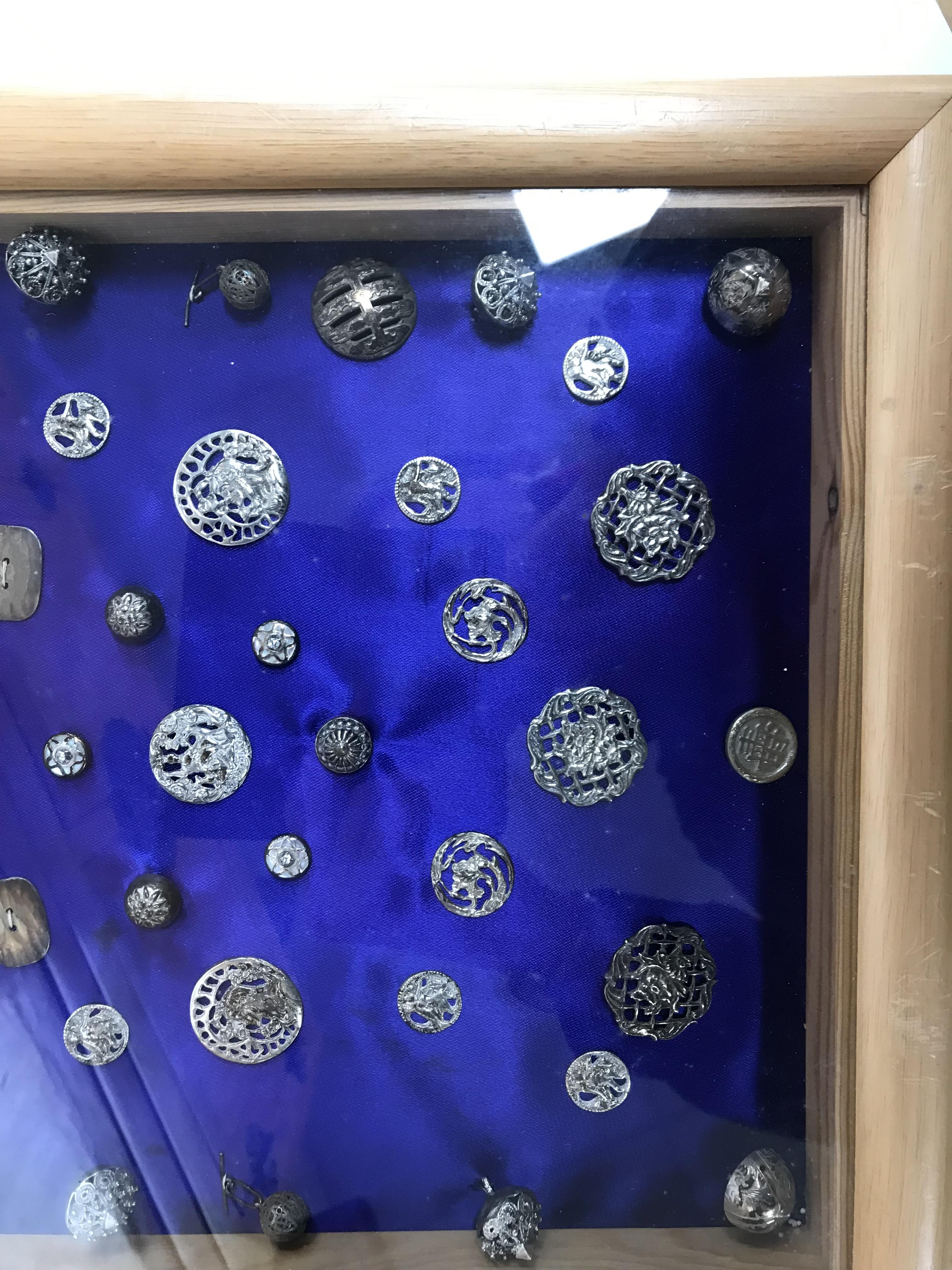 A collection of white metal buttons with - Image 3 of 3