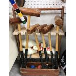 An Über Games croquet set with six malle