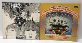 A collection of four LP records comprisi