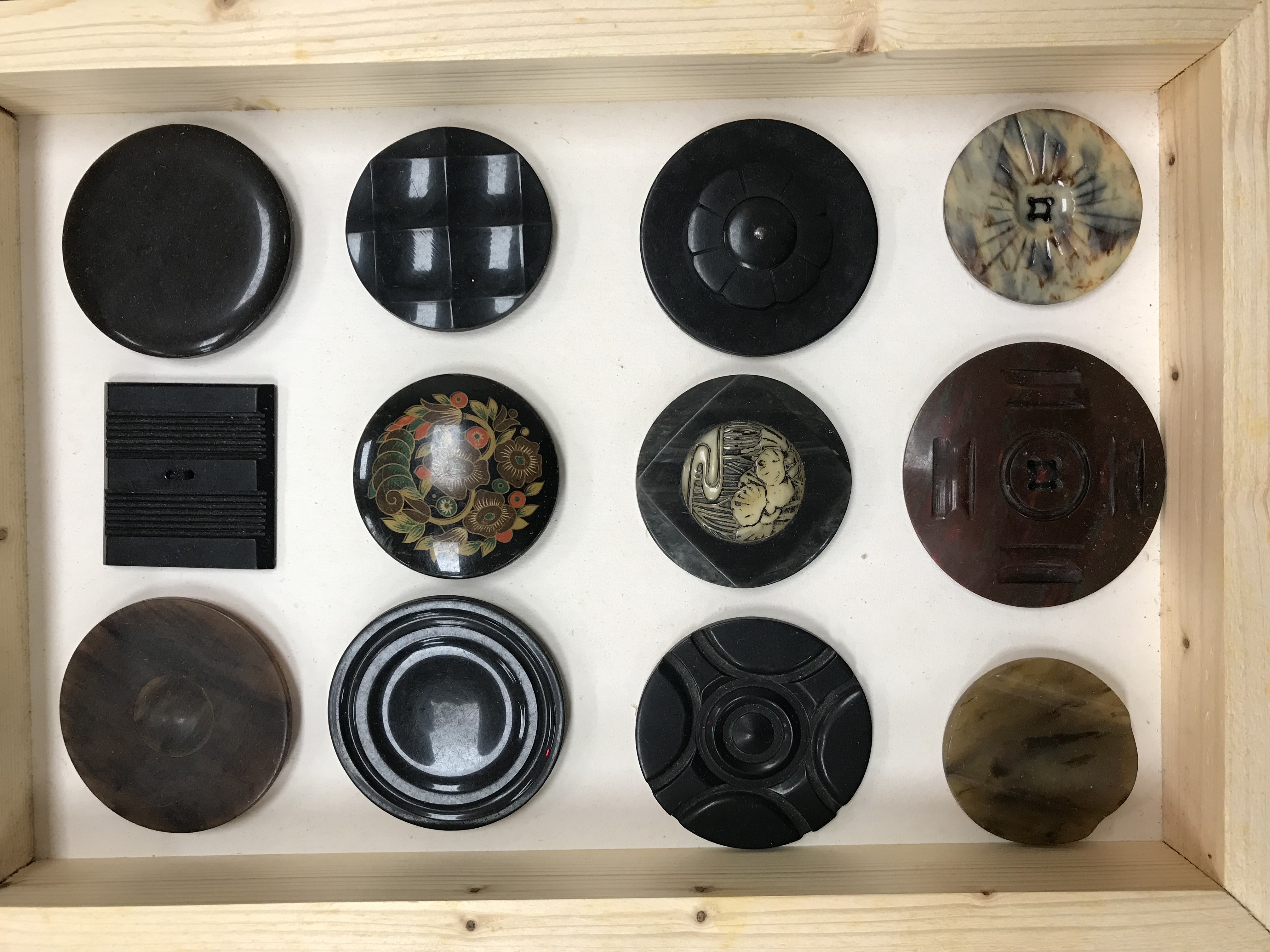 A framed collection of buttons in bakeli - Image 11 of 19