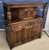 A 20th Century oak court cupboard in the