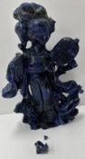 A Chinese carved lapis lazuli figure of