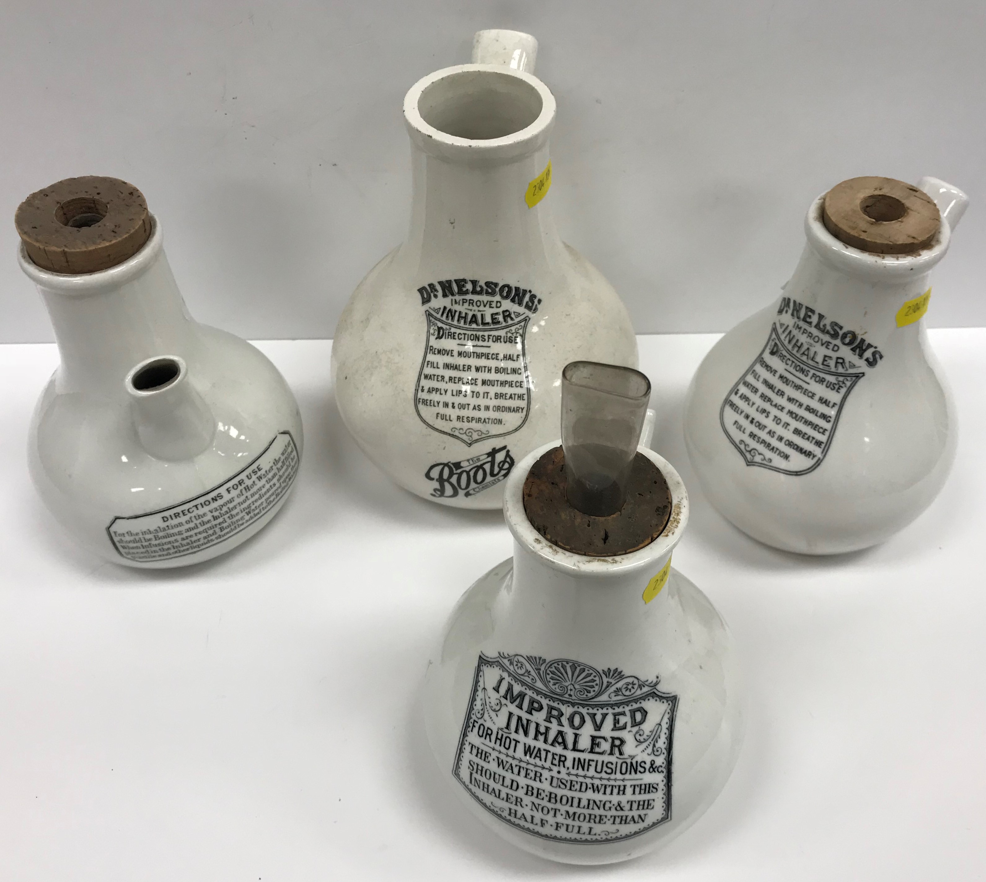 A collection of four pear shaped pottery