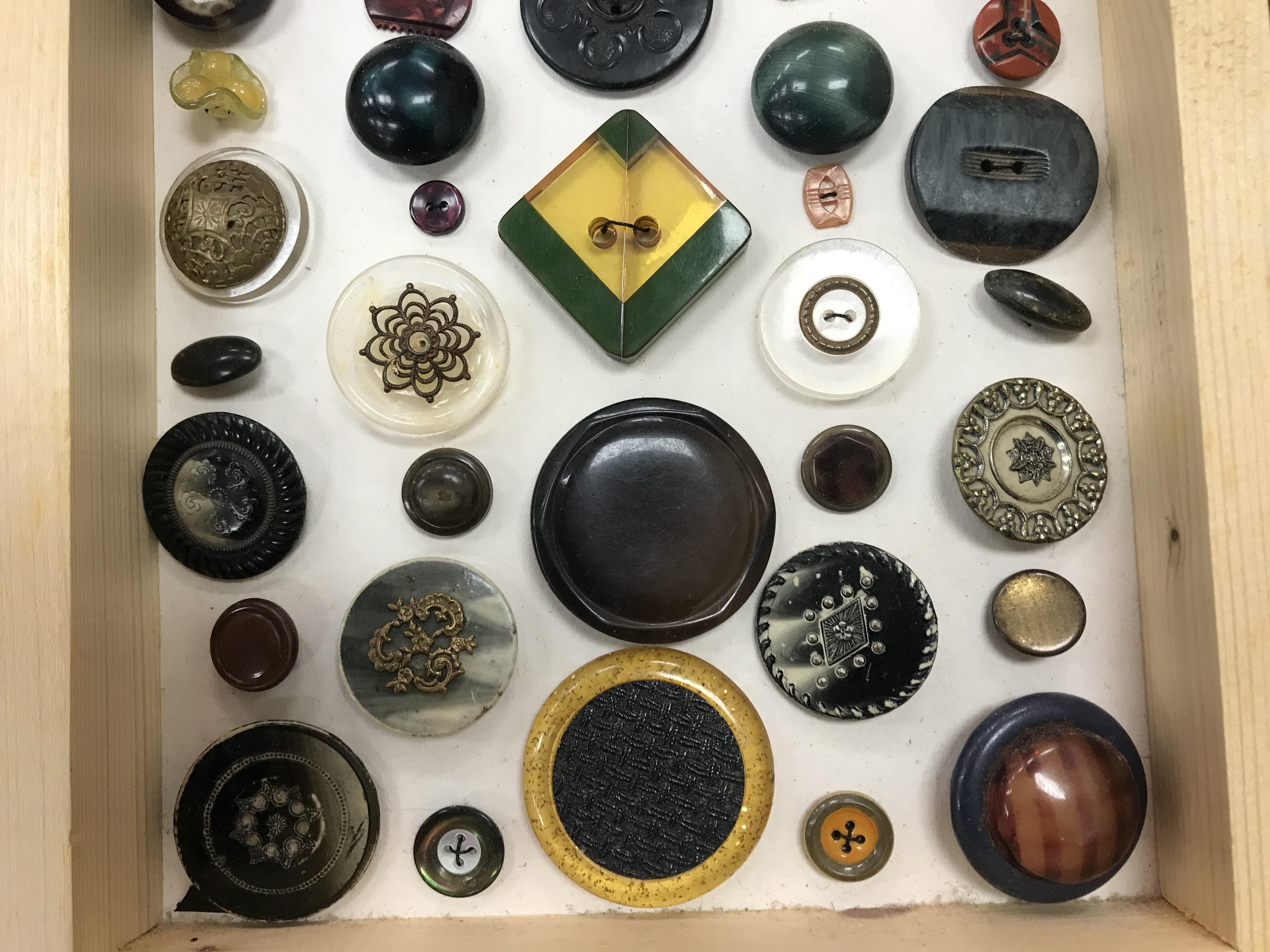 A framed collection of buttons in bakeli - Image 16 of 19