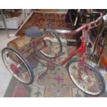 A vintage Triang trike of typical form w