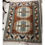 A 20th Century Persian rug, the blue and