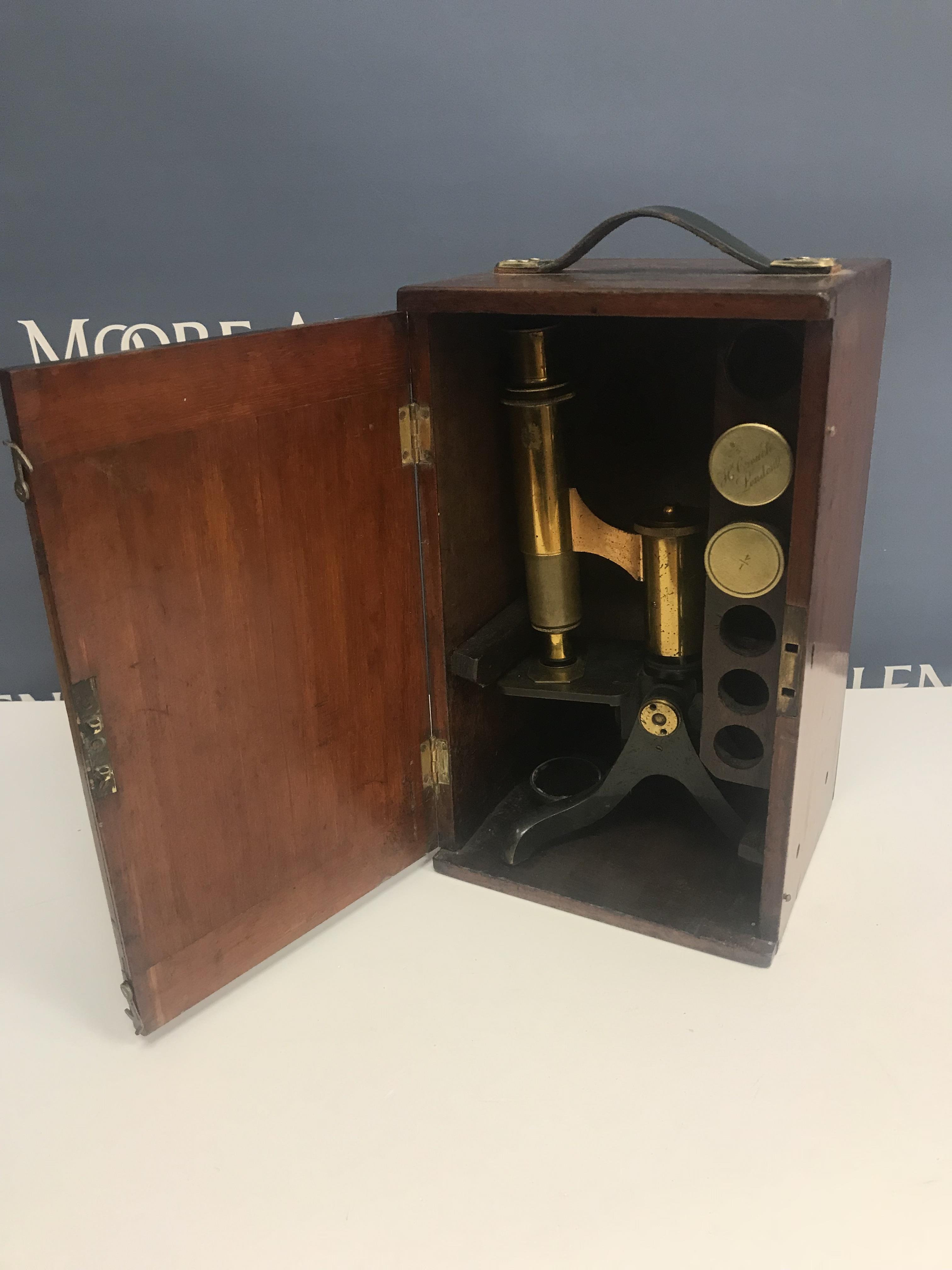 An early 20th Century brass microscope h