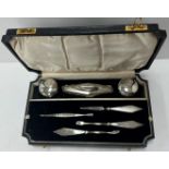 A George VI cased silver mounted manicur