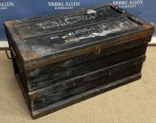 A vintage iron bound wooden travel trunk