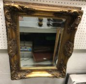 A circa 1900 moulded giltwood framed dom