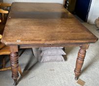 A Victorian walnut rectangular extending