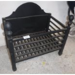 A modern cast iron fire basket of plain