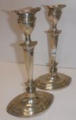 A pair of Edwardian silver table candles