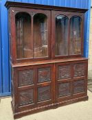 A Victorian oak bookcase cabinet, the up