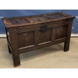 A 17th Century oak coffer, the plain top