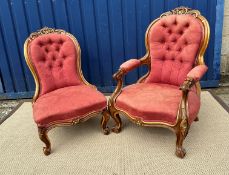 A Victorian carved walnut and gilt decor