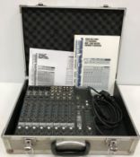 A Mackie 1202-VLZ Pro 12 channel mic / l