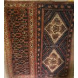 A vintage tribal rug of two panels, one