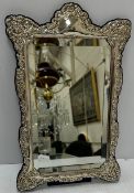 A modern silver framed easel back mirror