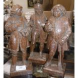 Three mid 20th Century carved wooden figures depicting Boswell inscribed "HC 1952",