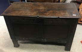 A 17th Century oak coffer, the plain two