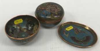 A Chinese cloisonne lidded bowl with floral medallion and butterfly decoration,