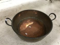 A Victorian twin-handled copper jam pan, 56 cm wide including handles x 19.