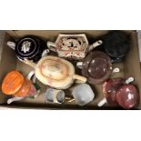 Four boxes containing a collection of various decorative teapots including Tourist ware "The Bunyan