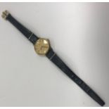A ladies Omega Deville wristwatch with leather strap