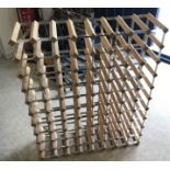 An 80 bottle wine rack, 81 cm wide x 22.