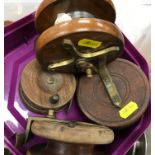 A collection of various fishing reels to include two Nottingham type star back reels and four other