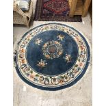 A Chinese circular superwash rug,