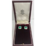 A pair of emerald (approx 2 carat each) and diamond ear studs, 1.