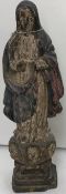 An 18th Century Continental or possibly Spanish Colonial carved and painted wooden figure of the