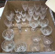 A collection of drinking glasses to include a set of six red wines,