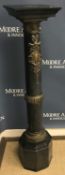 A 19th Century black marble and brass embellished column,