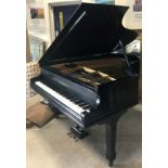 A Bechstein model A grand piano ebony cased circa 1920 on square tapered legs to spade feet and