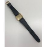 An 18 carat gold cased Eternamatic watch with leather strap numbered 780 inside,