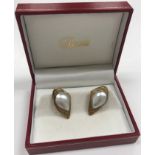 A pair of 9-carat gold and pearl ear studs, 3.3 cm long,15.