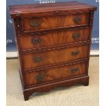 A reproduction mahogany bachelors chest in the Georgian style,