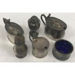 A collection of silver wares comprising two lidded mustards of plain oval form,