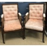 A pair of circa 1900 mahogany framed bérgère armchairs in the Georgian style,