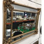 A modern gilt framed wall mirror in the 19th Century style,