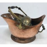 A copper coal bucket of typical form, together with a bronze hanging lamp / censer,