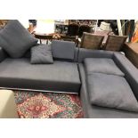 A B&B Italia charcoal grey upholstered corner sofa on tubular metal frame and supports,