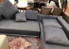 A B&B Italia charcoal grey upholstered corner sofa on tubular metal frame and supports,