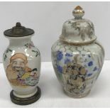 A Japanese Meiji Period Satsuma ware vase decorated with figures in an interior,